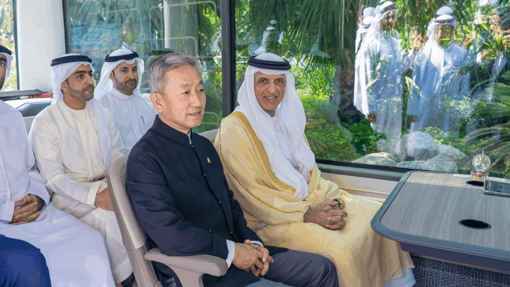 From right: H.H. Sheikh Saud bin Saqr Al Qasimi, UAE Supreme Council Member and Ruler of Ras Al Khaimah; and Zhang Yiming, Chinese ambassador to the UAE, riding WeRide’s Robobus

